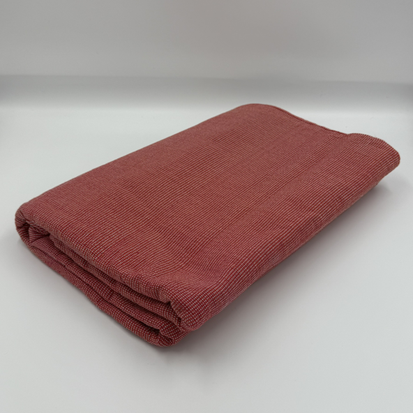 Angled front view with bag zipped and handles upright.