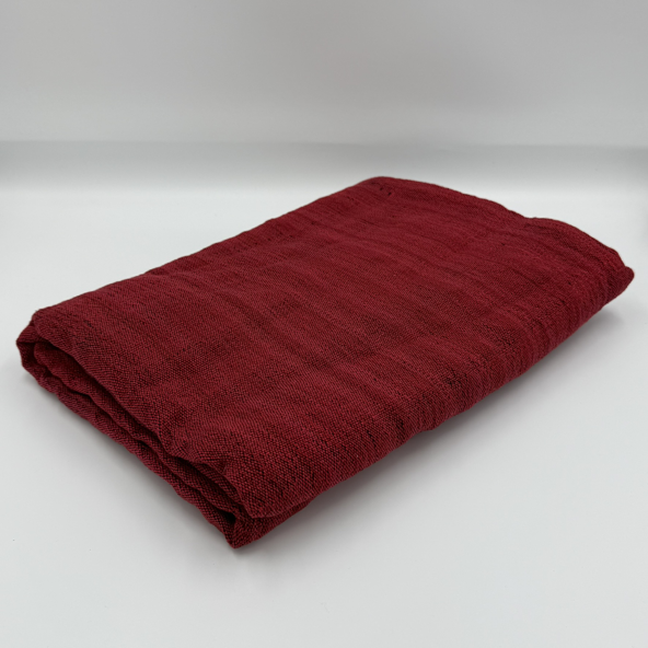 Angled front view with bag zipped and handles upright.