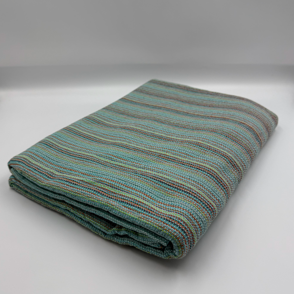 Angled front view with bag zipped and handles upright.