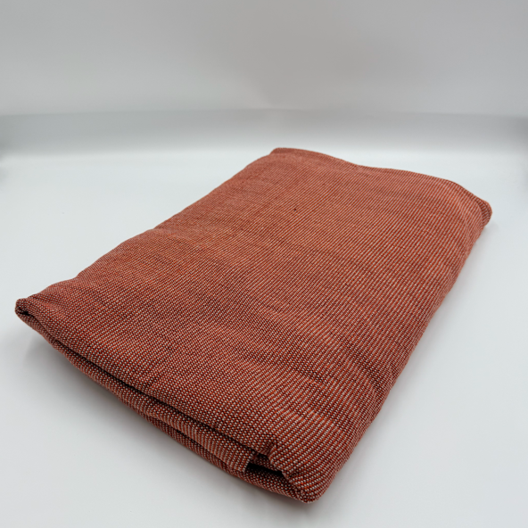 Angled front view with bag zipped and handles upright.