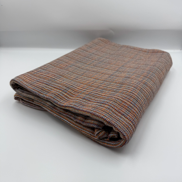 Angled front view with bag zipped and handles upright.