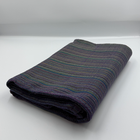 Angled front view with bag zipped and handles upright.